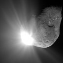 The Deep Impact impactor collides with comet Tempel 1.