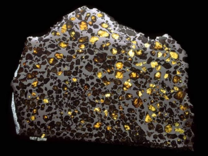 A polished, enlarged section of the Esquel pallasite meteoritemeteorite that delivered tiny nano-diamonds to Earth. This is a common occurrence, as there is believed to be substantial amounts of high-pressure carbon in the galaxies, and thus some diamonds
