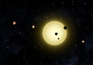 The Kepler-11 system where the planets are all roughly the same size and their orbits spaced at roughly the same distances from each other.  The the planets are, in the view of scientists involved with the study, “peas in a pod.”