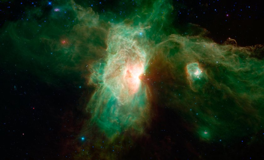 Orion Molecular Cloud Complex, dominated in the center of this view by the brilliant Flame nebula (NGC 2024). The smaller, glowing cavity falling between the Flame nebula and the Horsehead is called NGC 2023.