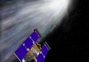 This is an artist's concept of the Stardust spacecraft beginning its flight through gas and dust around comet Wild 2. Stardust found glycine in some of the samples it collected. Credit: NASA/JPL 