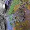 A color-enhanced image of the delta in Jezero Crater, which once held a lake. Ancient rivers ferried clay-like minerals (shown in green) into the lake, forming the delta.