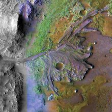 A color-enhanced image of the delta in Jezero Crater, which once held a lake. Ancient rivers ferried clay-like minerals (shown in green) into the lake, forming the delta.