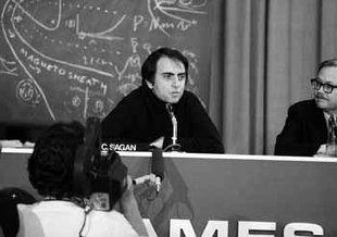 The late, renowned astronomer Carl Sagan shown at a November, 1973 press conference held at NASA's Ames Research Center, Moffett Field, Calif., while discussing the Pioneer 10 spacecraft's mission to obtain images of Jupiter.