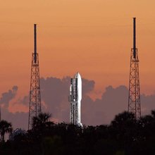 As the sun comes up over Cape Canaveral Air Force Station in Florida, preparations are under way at Space Launch Complex 41 to launch the United Launch Alliance Atlas V-551 launch vehicle carrying NASA's Juno spacecraft.