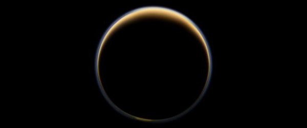 Sunset on Saturn’s moon Titan reveals the atmosphere around the moon as seen from the night side with NASA’s Cassini spacecraft.