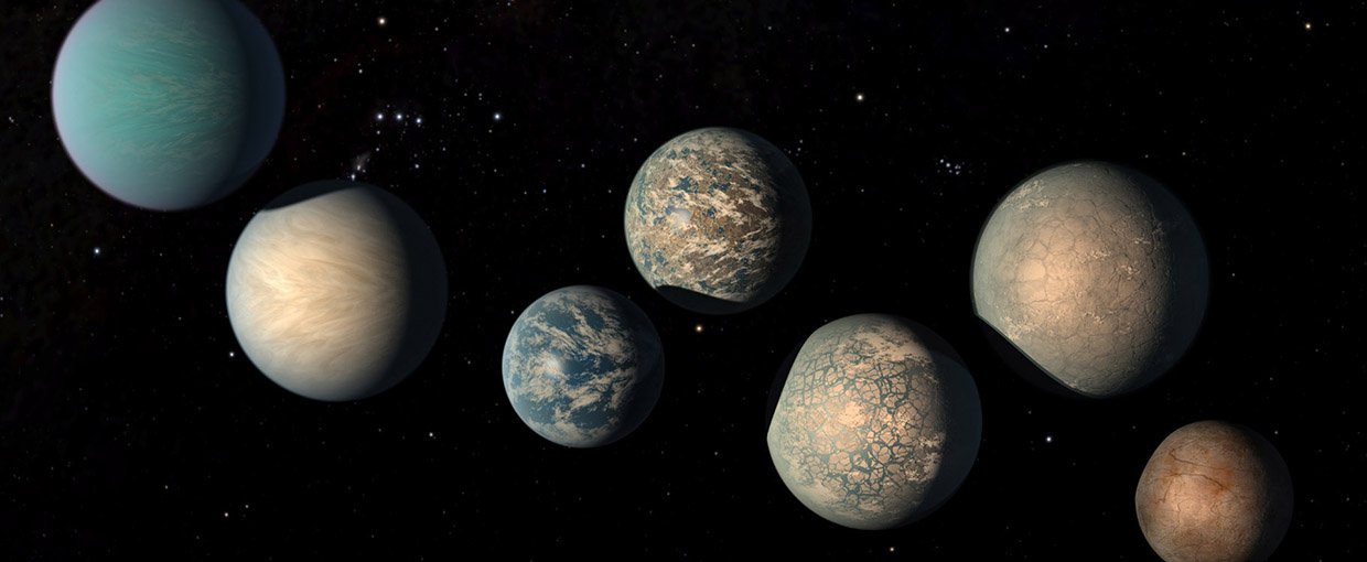 This illustration shows the seven Earth-size planets of TRAPPIST-1. The image does not show the planets’ orbits to scale, but highlights possibilities for how the surfaces of these intriguing worlds might look.