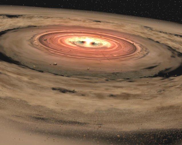 This illustration shows a protoplanetary disk of dust and gas around a young star. New research by Rice University shows that Earth’s nitrogen came from both inner and outer regions of the disk that formed our solar system, contrary to earlier theory.