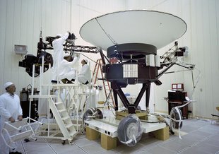 This archival image taken at NASA’s Jet Propulsion Laboratory on March 23, 1977, shows engineers preparing the Voyager 2 spacecraft ahead of its launch later that year.