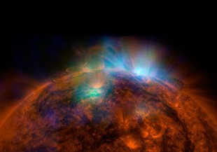 X-rays stream off the Sun in this image showing observations by NASA's Nuclear Spectroscopic Telescope Array, or NuSTAR, overlaid on a picture taken by NASA's Solar Dynamics Observatory (SDO).