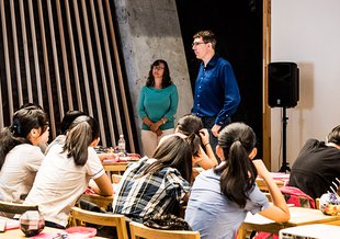 Eric Smith (far right) addresses a class of secondary school students visiting the Earth Life Science Institute (ELSI).