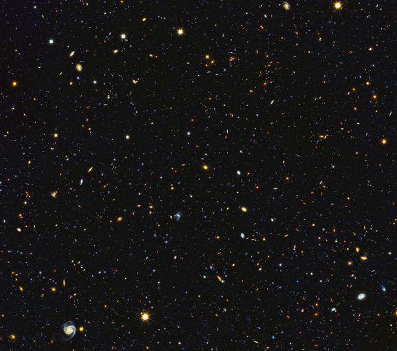 One of the most comprehensive portraits yet of the Universe’s evolutionary history, from observations by space and ground-based telescopes. Each of the approximately 15,000 specks and spirals are galaxies, widely distributed in time and space.