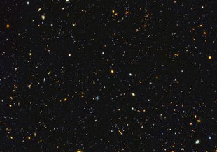 One of the most comprehensive portraits yet of the Universe’s evolutionary history, from observations by space and ground-based telescopes. Each of the approximately 15,000 specks and spirals are galaxies, widely distributed in time and space.