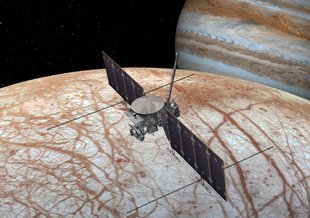 Europa Clipper, depicted flying over the surface of Europa.