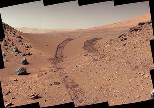 This look back at a dune that NASA's Curiosity Mars rover drove across was taken by the rover's Mast Camera (Mastcam) on the 538th Martian day, or sol, of Curiosity's mission. For scale, the distance between the parallel wheel tracks is about 2.7 meters.