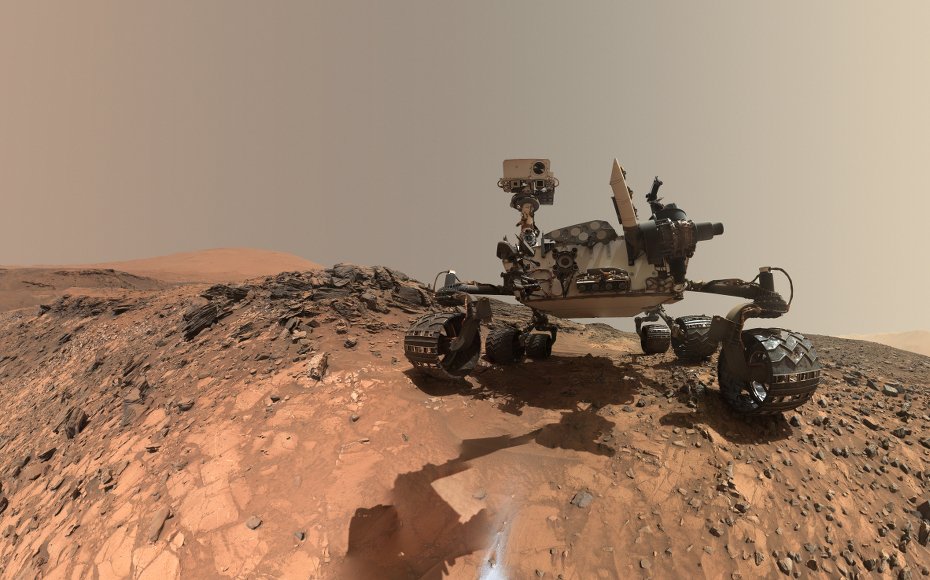 This low-angle self-portrait of NASA's Curiosity Mars rover shows the vehicle at the site from which it reached down to drill into a rock target called "Buckskin." The MAHLI camera on Curiosity's robotic arm took multiple images on Aug. 5, 2015.