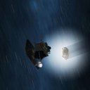 This artist's animation shows a sped-up view of the EPOXI mission spacecraft during its Nov. 4, 2010 flyby of comet Hartley 2. The fluffy shell around the comet, called a coma, is made up of gas and dust that blew off the comet's core, or nucleus.