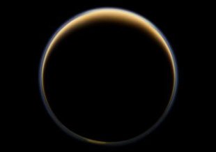 Sunset on Saturn’s moon Titan reveals the atmosphere around the moon as seen from the night side with NASA’s Cassini spacecraft. Credit: NASA/JPL-Caltech/SSI