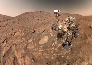 In this illustration, NASA's Perseverance Mars rover uses the Planetary Instrument for X-ray Lithochemistry (PIXL). The X-ray spectrometer will help search for signs of ancient microbial life in rocks.