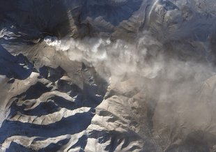 Researchers think emissions from volcanos, such as the one seen here, may have led to a dramatic rise in CO2 leading to a mass extinction 200 million years ago. (Photo/NASA Earth Observatory)