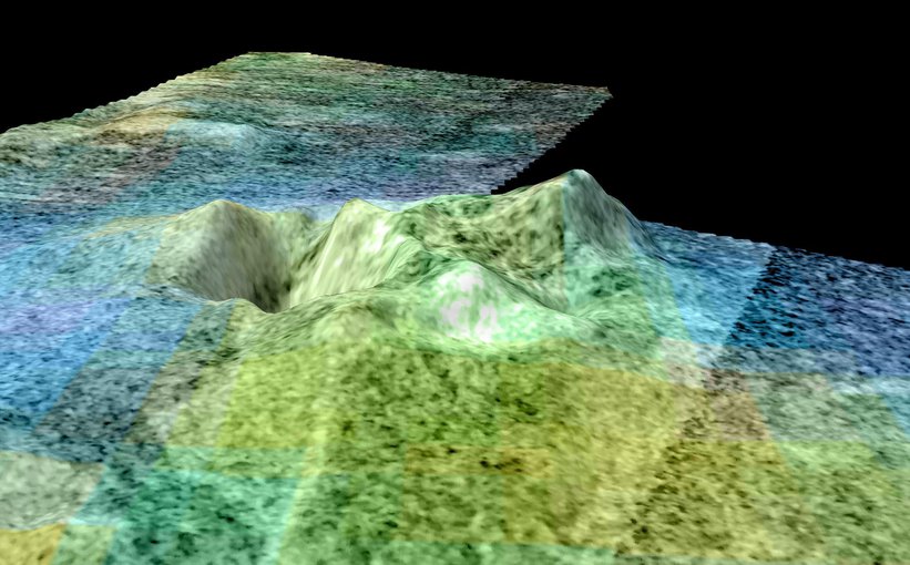 A false-color, 3D representation of radar data from Cassini showing a feature on Titan called Sotra Facula, which appears to be an inactive cryovolcano.