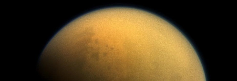An image of Saturn's moon Titan, which is surrounded by a thick haze. Scientists speculate that a similar haze surrounding early Earth may have helped to make it habitable. Source: NASA.