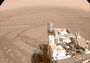 In this illustration, NASA's Perseverance Mars rover uses the Planetary Instrument for X-ray Lithochemistry (PIXL). The X-ray spectrometer will help search for signs of ancient microbial life in rocks.