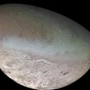 This global color mosaic of Neptune's moon Triton was taken in 1989 by Voyager 2 during its flyby of the Neptune system.