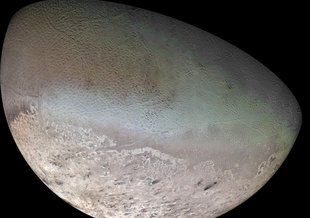 This global color mosaic of Neptune's moon Triton was taken in 1989 by Voyager 2 during its flyby of the Neptune system.
