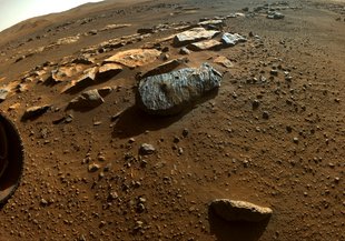 Two holes are visible in the rock, nicknamed “Rochette,” from which NASA’s Perseverance rover obtained its first core samples. The rover drilled the hole on the left, called “Montagnac,” Sept. 7, and the hole on the right, known as “Montdenier,” Sept. 1.