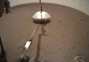 NASA's InSight lander deployed its Wind and Thermal Shield on Feb. 2 (Sol 66). The shield covers InSight's seismometer, which was set down onto the Martian surface on Dec. 19, 2018.