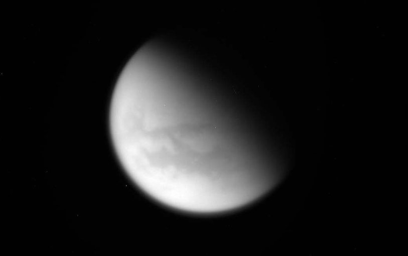 Floating high above the hydrocarbon lakes, wispy clouds have finally started to return to
Titan’s northern latitudes. Credit: NASA
