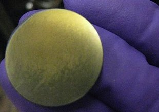 A picture of the aluminum plate with a chemical deposit on it. Credits: Karen Smith/NASA Goddard