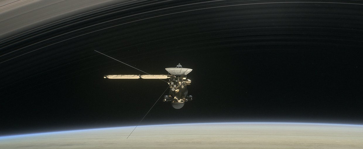 In the still from the short film Cassini's Grand Finale, the spacecraft is shown diving between Saturn and the planet's innermost ring.