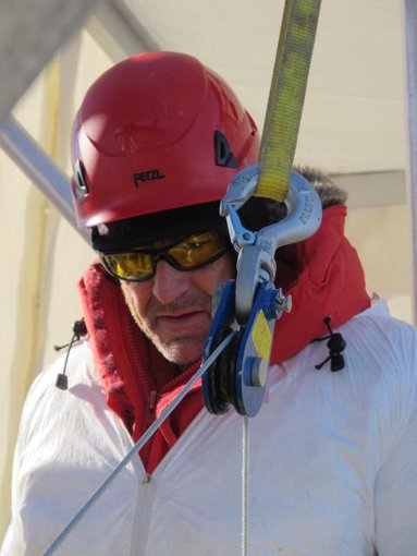 John Priscu, deploying instruments into the borehole into subglacial Lake Whillans on the West Antarctic Ice Sheet in 2013.