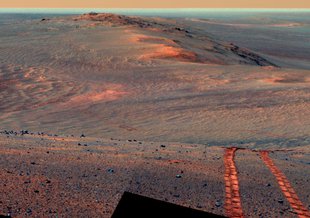 This scene from the panoramic camera (Pancam) on NASA's Mars Exploration Rover Opportunity looks back toward part of the west rim of Endeavour Crater that the rover drove along, heading southward, during the summer of 2014.