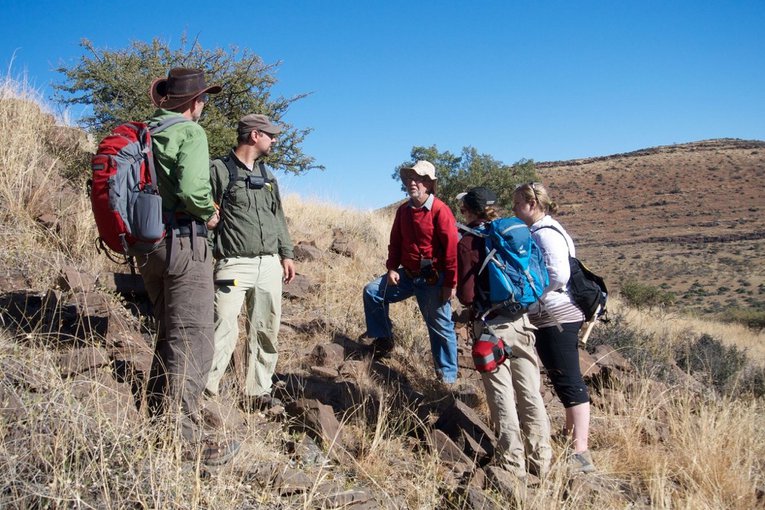 Participants in 2014 field excursion to collect fossils near the town of Kuruman in the Northern Cape Province of South Africa. From L to R: Clark Johnson,University of Wisconsin, Madison; Aaron Satkoski, University of Wisconsin, Madison; Nicolas Beukes, University of Johannesburg, South Africa; Breana Hashman,University of Wisconsin, Madison; and Kira Lorber, University of Cincinnati. Photo/Andrew Czaja