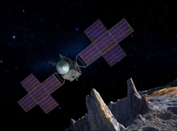 An artist’s illustration of the spacecraft of NASA’s Psyche mission near the mission’s metal-rich.