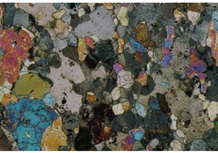 Cross-polarized light thin section of NWA 7325. Width of field = 5 mm