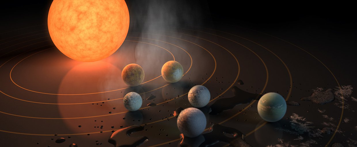 This artist's concept appeared on the Feb. 23, 2017 cover of the journal Nature announcing that the nearby star TRAPPIST-1, an ultra-cool dwarf, has seven Earth-sized planets orbiting it.