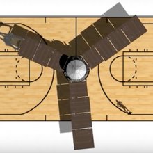 Juno spacecraft compared to a regulation basketball court.